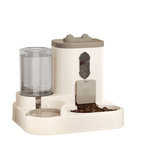 Pet feeding and water station with transparent water bowl and food compartment on a white background